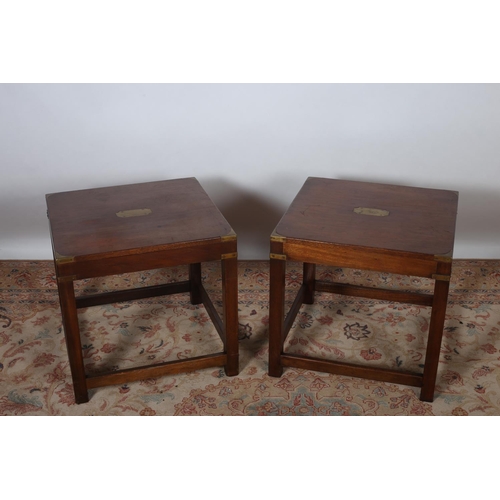 80 - A PAIR OF VINTAGE MAHOGANY AND BRASS BOUND LAMP TABLES each of square form with brass inset on squar... 