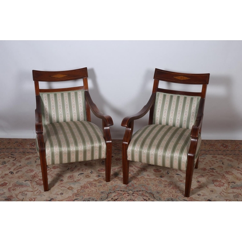 87 - A PAIR OF SHERATON DESIGN MAHOGANY AND SATINWOOD INLAID ARMCHAIRS each with a curved top rail and up... 