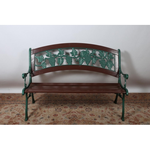 41 - A CAST METAL AND STAINED WOOD GARDEN BENCH the shaped top rail above a vine and foliage splat with s... 