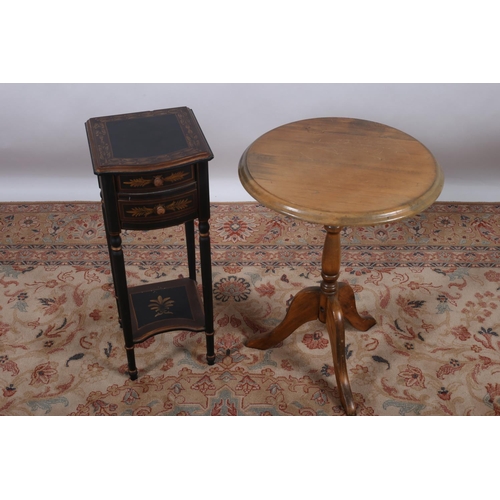 560 - A CONTINENTAL EBONISED PARCEL GILT AND PAINTED OCCASIONAL TABLE of rectangular bowed outline with tw... 