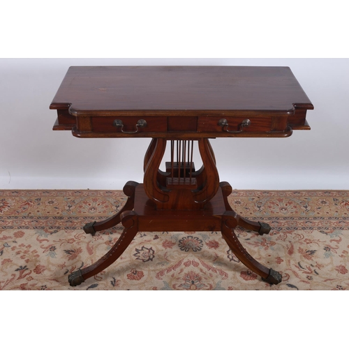 67 - A REGENCY DESIGN MAHOGANY SIDE TABLE the shaped top with two frieze drawers raised on dual  lyre sup... 