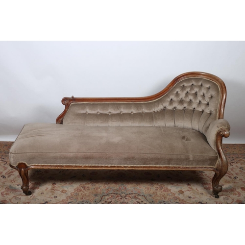 23 - A 19TH CENTURY MAHOGANY CHAISE LONGUE the shaped top rail above a button upholstered back and seat w... 