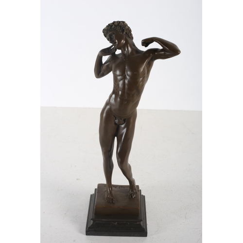 55 - AFTER MICHELANGELO A BRONZE FIGURE modelled as a classical male shown standing with arms folded on a... 