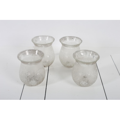 58 - FOUR ENGRAVED GLASS SHADES each of bulbous form with beadwork decoration, base 3cm (d) top 9cm (d) t... 