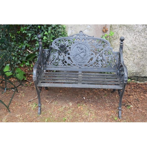 802 - A CAST IRON GARDEN SEAT the shaped top rail above a pierced foliate back centred by an oval cameo wi... 