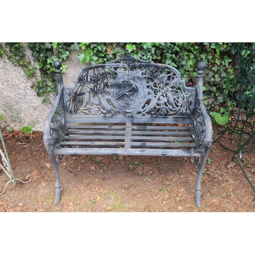 803 - A CAST IRON GARDEN SEAT the shaped top rail above a pierced foliate back centred by an oval cameo wi... 