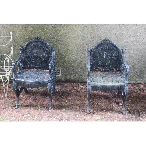 810 - A FINE AND IMPRESSIVE SET OF FOUR COALBROOKDALE DESIGN CAST IRON GARDEN CHAIRS each depicting a seas... 