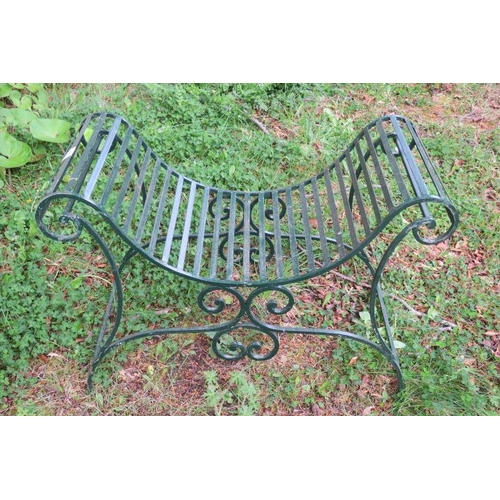 813 - A WROUGHT IRON DOUBLE SCROLL END SEAT the slatted seat on scroll supports with splayed legs 66cm (h)... 