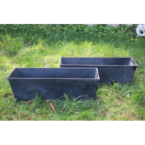 816 - A PAIR OF METAL PLANTERS each of rectangular tapering outline with ring handles 40cm (h) x 121cm (w)... 