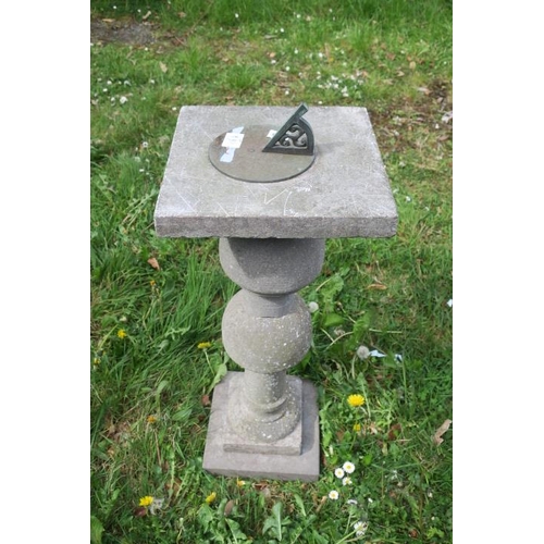 818 - A LIMESTONE SUNDIAL the bronze dial above a baluster column on stepped base 90cm (h) x 35cm (w) x 35... 