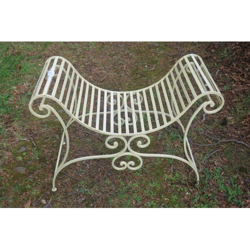 827 - A WROUGHT IRON DOUBLE SCROLL END SEAT the slatted seat on scroll supports with splayed legs 66cm (h)... 