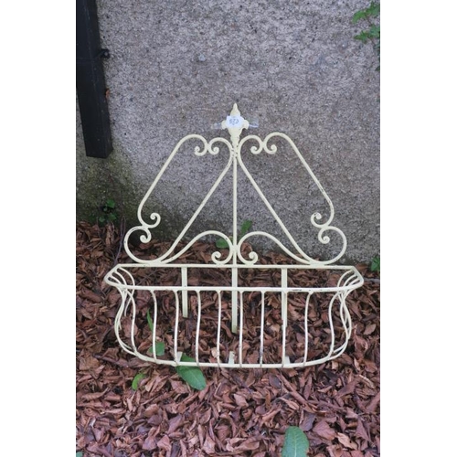 835 - A WROUGHT IRON WALL MOUNTED PLANTER of rectangular outline with scroll decoration and fleur de lis f... 