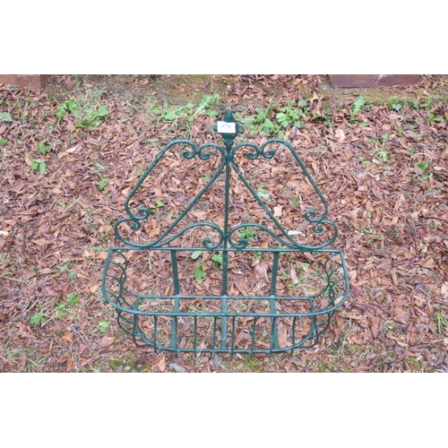 844 - A WROUGHT IRON WALL MOUNTED PLANTER of rectangular outline with scroll decoration and fleur de lis f... 