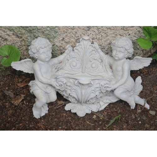 848 - A COMPOSTION WALL MOUNTED PLANTER the foliate and shell shaped bowl flanked by winged cherubs 30cm (... 