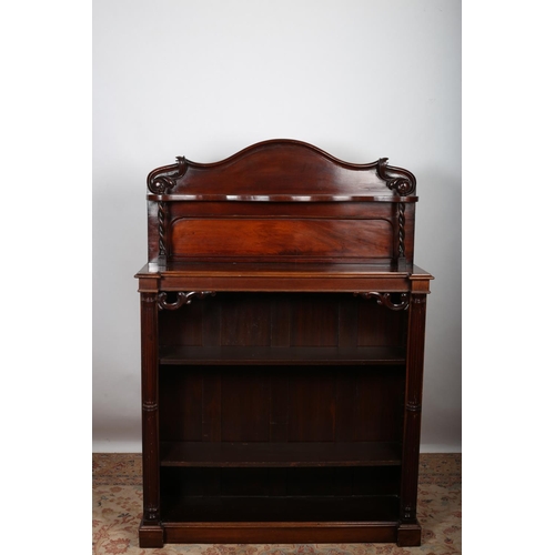 10 - A 19TH CENTURY MAHOGANY OPENFRONT BOOKCASE the superstructure with a rectangular arched back and ser... 