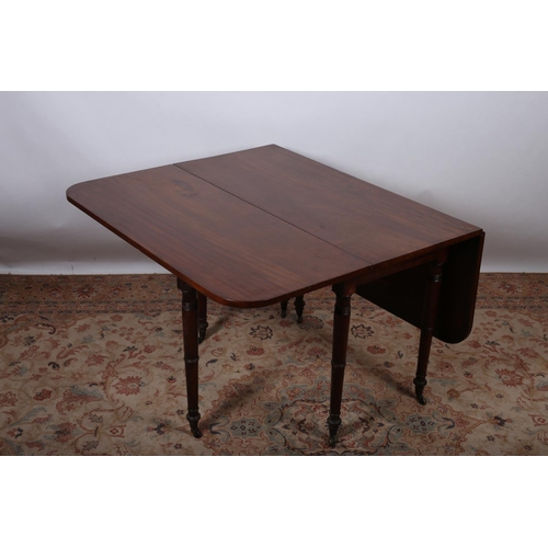 27 - A GEORGIAN MAHOGANY DROP LEAF TABLE of rectangular outline with rounded corners the hinged top above... 