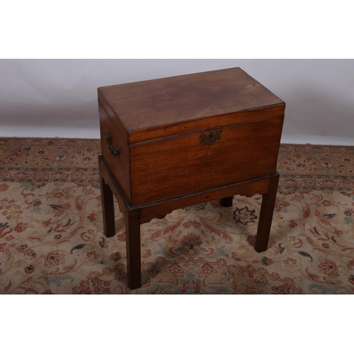 33 - TWO GEORGIAN MAHOGANY CELLARETTES ON STAND each of rectangular outline the hinged lid containing com... 