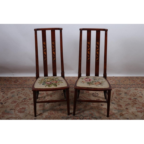 37 - A PAIR OF ARTS AND CRAFTS MAHOGANY INLAID SIDE CHAIRS each with a curved top rail with vertical spla... 