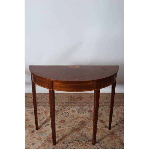 45 - A SHERATON DESIGN MAHOGANY AND SATINWOOD INLAID SIDE TABLE of demilune outline the shaped top raised... 