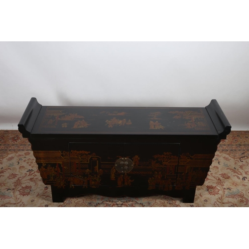 54 - A CHINESE BLACK LACQUERED AND JAPANED SEAT decorated with figures and horses.  The shaped top above ... 