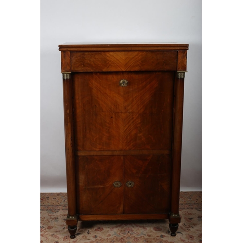 62 - AN EMPIRE DESIGN MAHOGANY AND GILT BRASS MOUNTED ESCRITOIRE the rectangular top with frieze drawer a... 