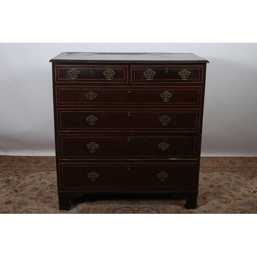 64 - A GEORGIAN MAHOGANY CHEST with satinwood string inlay the rectangular top with gadrooned rim above t... 