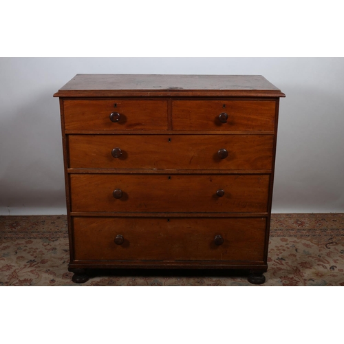 67 - A VICTORIAN MAHOGANY CHEST of rectangular outline the shaped top above two short and three long draw... 