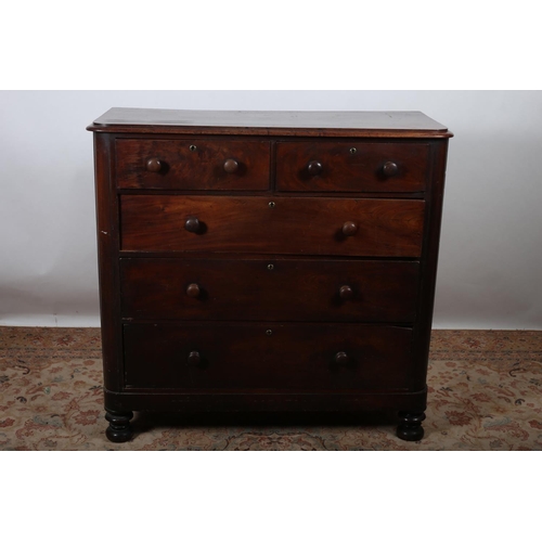 69 - A VICTORIAN MAHOGANY CHEST of rectangular outline the shaped top above two short and three long grad... 