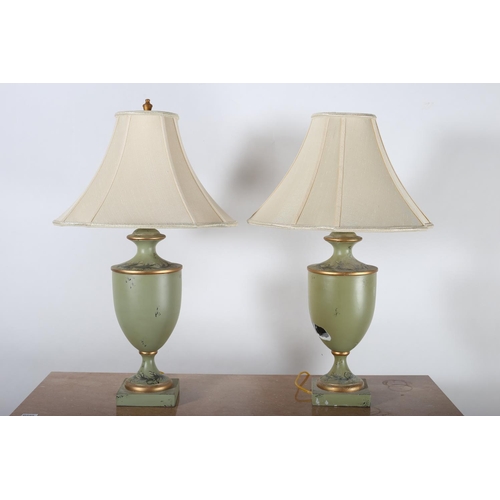 690 - TWO TOLEWARE TABLE LAMPS with shades together with a pair of composition and polychrome table lamps ... 