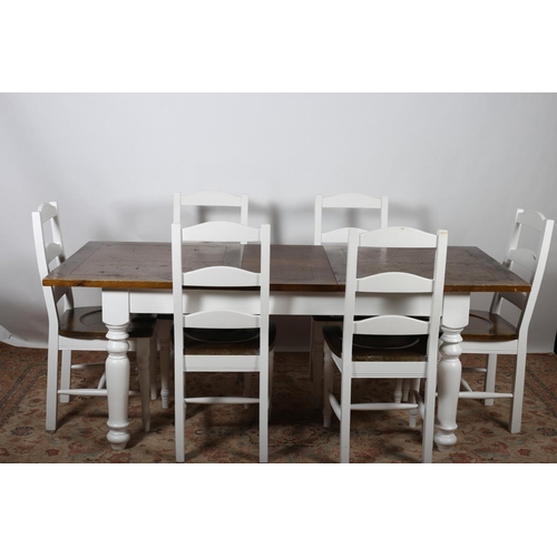 698 - A SEVEN PIECE WHITE PAINTED AND STAINED WOOD BREAKFAST SUITE comprising six chairs each with a ladde... 