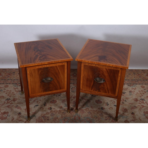 79 - A PAIR OF SHERATON DESIGN MAHOGANY AND SATINWOOD CROSS BANDED CHESTS each of rectangular form the sh... 