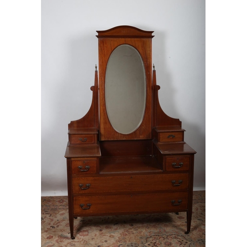 9 - A VINTAGE MAHOGANY AND SATINWOOD INLAID DRESSING TABLE the superstructure with oval bevelled glass m... 