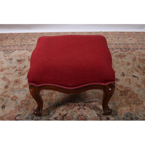 423 - A VICTORIAN DESIGN MAHOGANY STOOL the upholstered seat above a moulded apron on cabriole legs with s... 