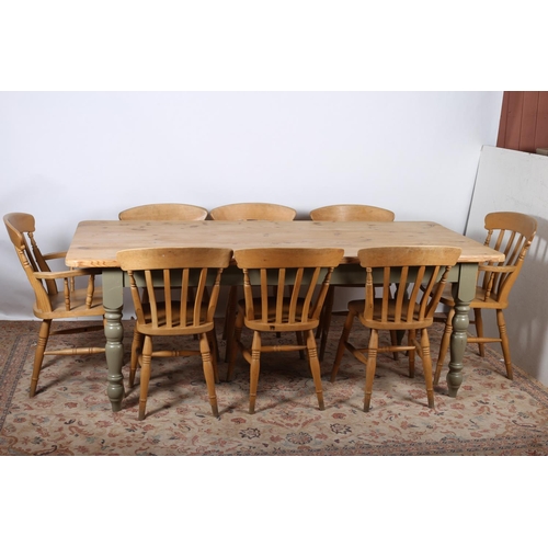 64 - A NINE PIECE PINE AND PAINTED BREAKFAST SUITE comprising eight chairs including a pair of elbow chai... 