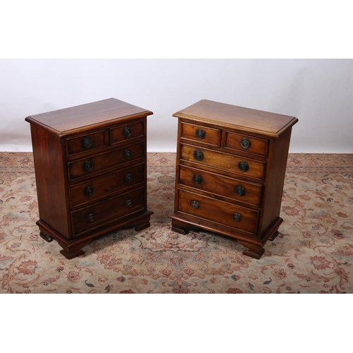 71 - A PAIR OF GEORGIAN DESIGN MAHOGANY CHESTS each of rectangular outline with two short and three long ... 