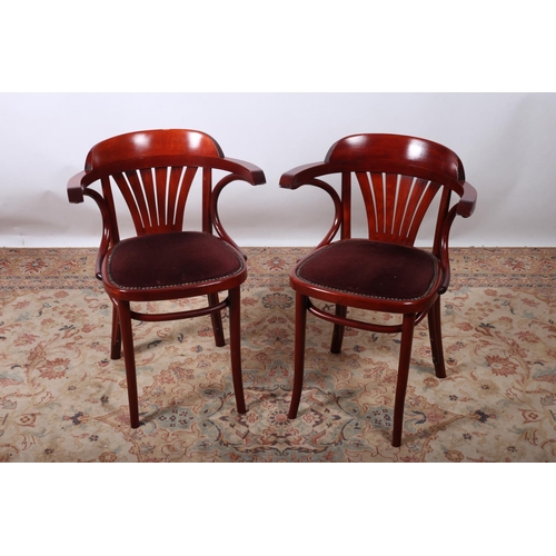 74 - A PAIR OF BENTWOOD ELBOW CHAIRS of typical form with upholstered seats