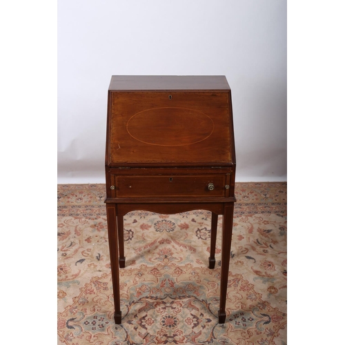 75 - A VINTAGE MAHONGANY AND SATINWOOD INLAID BUREAU the hinged writing slope with pigeon holes and drawe... 