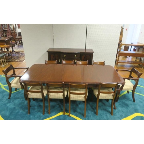 100 - A TWELVE PIECE MAHOGANY DINING ROOM SUITE comprising ten regency design dining chairs including a pa... 