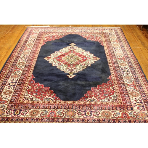 127 - A GABBEH WOOL RUG the beige and wine ground with central panel filled with flowerheads and foliage w... 