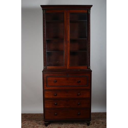 399 - A 19TH CENTURY MAHOGANY SECRETAIRE LIBRARY BOOKCASE the moulded cornice above a pair of glazed doors... 