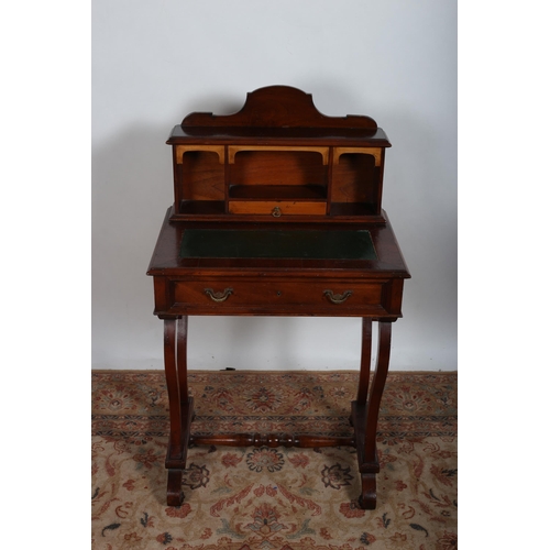 400 - A VINTAGE MAHOGANY WRIITNG DESK the superstructure with open compartments and frieze drawer above a ... 