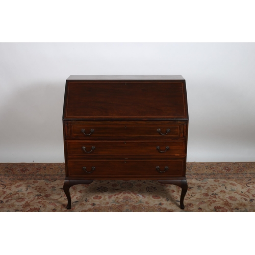 620 - A VINTAGE MAHOGANY AND SATINWOOD INLAID BUREAU the hinged writing slope containing pigeon holes and ... 