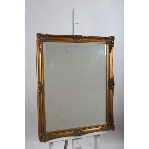 633 - A PAIR OF CONTINENTAL SILVER FRAMED MIRRORS together with a gilt frame mirror (3)