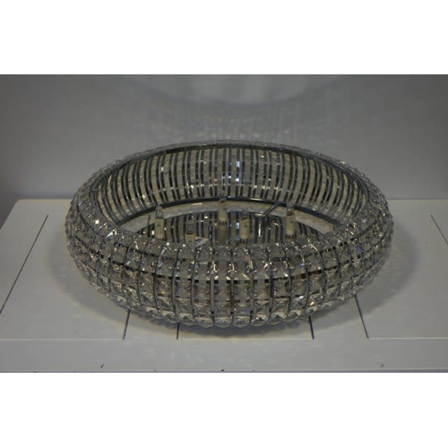 636 - A MODERN CHROME AND CUT GLASS LIGHT of circular outline with faceted cut glass studs 17cm h x 54cm d... 