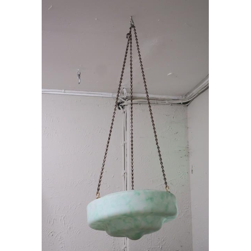 650 - A VINTAGE GREEN AND OPALINE GLASS CEILING SHADE of circular tapering form suspended on link chains 
... 