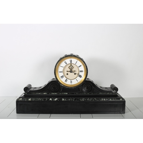 68 - A VICTORIAN BLACK MARBLE AND GREY VEINED MARBLE MANTLE CLOCK the enamel dial with Roman numerals wit... 