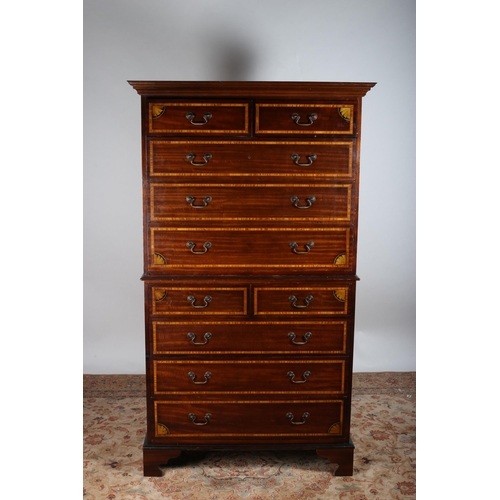 218 - A GEORGIAN DESIGN MAHOGANY AND SATINWOOD CHEST ON CHEST the moulded cornice above two short and thre... 