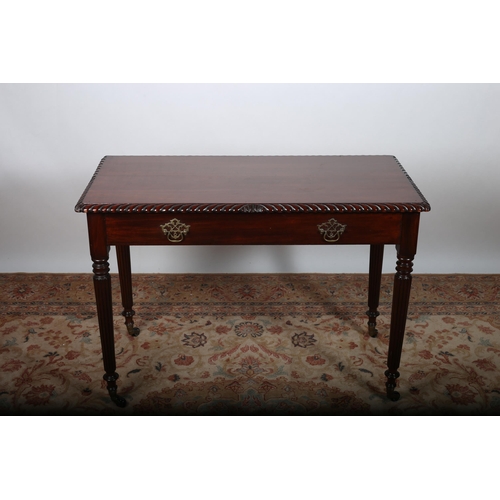 24 - A CHIPPENDALE DESIGN MAHOGANY SIDE TABLE of rectangular outline with gadrooned rim above one mock fr... 
