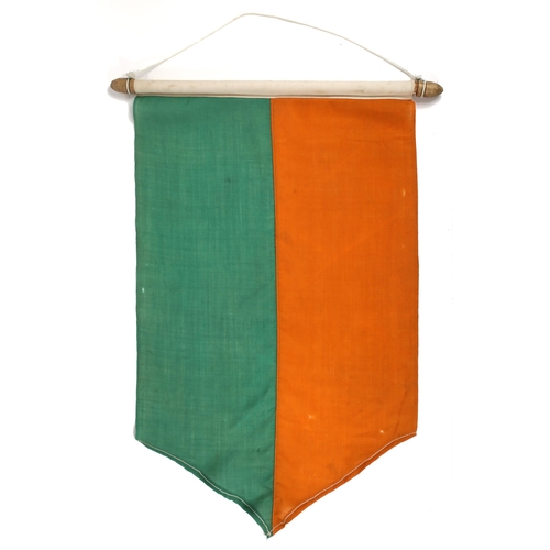 109 - Banner in the form of the ribbon of the 1916 Rising Service Medal. A green and orange linen banner o... 