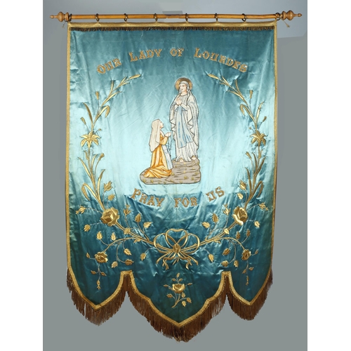 165 - A 19th century processional banner venerating Our Lady of Lourdes. A blue silk banner with gilt broc... 